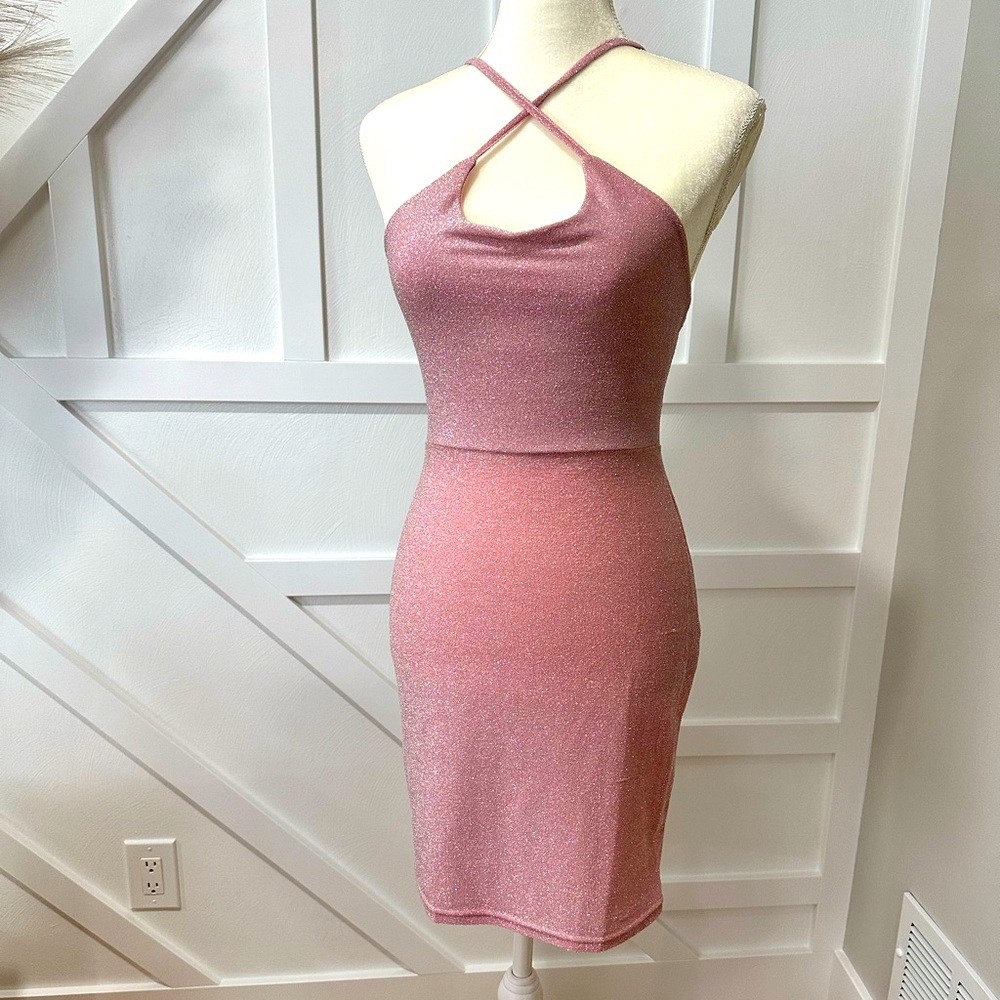 Pale pink shimmering dress.